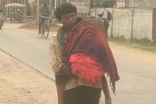father-walks-carrying-daughter-body-on-shoulder-in-sarguja