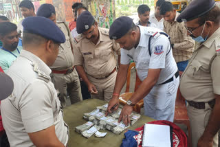 Police Recover huge Money From a Bike Rider