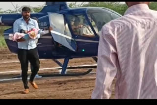 Pune family brings newborn girl child to home in a chopper