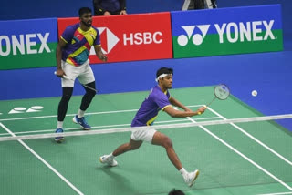 Wang Chan in their first round fixture of the Korea Open Badminton Championships 2022