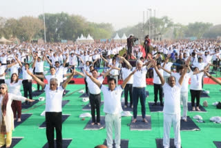 World Health Day Lok Sabha Speaker union ministers perform yoga at Red Fort