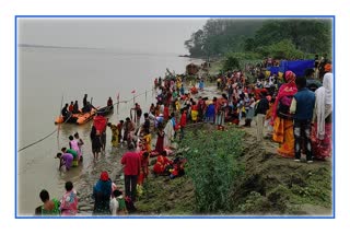 Devotees gather on the banks of brahmaputra of Shilghat on the occasion of Ashokastami