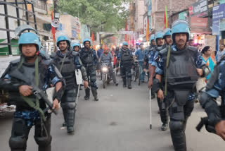 Flag march by security forces