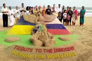 stop war message by sand artist sudam pradhan in sand art at puri sea beach