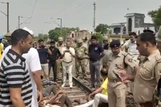 Farmers affected by the land acquisition process for the Delhi Mumbai Industrial Corridor (DMIC) and Delhi Dedicated Freight Corridor Corporation (DFCC) today protested on the railway tracks near the Bodaki railway station in Greater Noida