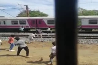 Watch: Chennai College students pelts stone at running train