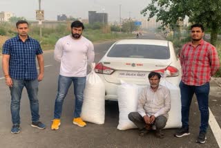 Delhi Police arrested one accused with ganja second accused absconding in car