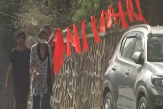 banners and saffron flags put up by hindu sena in jnu campus