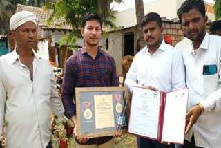 young man obtained rank in english ma in davangere karnataka