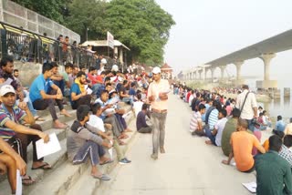 students preparing for competitive exam at ganga ghat in patna