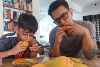 Aamir Khan, son Azad gorge mangoes like no one is watching, see adorable pics