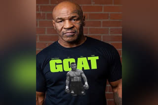 Mike Tyson punches man, Mike Tyson punches on plane, Mike Tyson viral video, Mike Tyson news