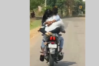 Watch Karnataka lovers bizarre joyride on bike goes viral