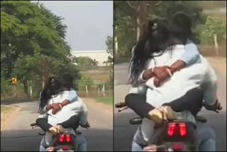 Romance while bike Riding: A Youth detained  Romance while bike Riding case against young man  പ്രണയം നടുറോഡിലെ അഭ്യാസ പ്രകടനമായതിനെ തുടര്‍ന്ന് കര്‍ണാടകയില്‍ യുവാവിനെതിരെ നടപടി