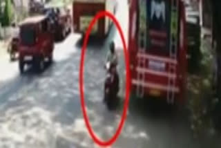 Shocking video: Biker caught between two speeding buses