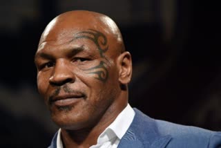 Watch: Mike Tyson punches man on plane, video goes viral  വിമാനത്തിൽ ശല്യപ്പെടുത്തിയ യുവാവിന്‍റെ മുഖം ഇടിച്ച് തകർത്ത് മൈക്ക് ടൈസൻ – വിഡിയോ  മൈക് ടൈസൺ  Mike Tyson plane fight video  സഹയാത്രികനെ മുഖത്തിടിച്ച് മൈക്ക് ടൈസണ്‍  Mike Tyson slaps fellow passenger in the face  മുന്‍ ലോക ബോക്‌സിങ്ങ് ഹെവി വെയ്റ്റ് ചാംമ്പ്യന്‍ മൈക്ക് ടൈസണ്‍  Former World Boxing Heavyweight Champion Mike Tyson  WATCH MIKE TYSON PUNCHES MAN ON PLANE VIDEO GOES VIRAL