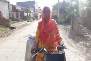 Woman Sells Milk On Bike In Panipat