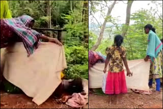 Shocking video; A beggar giving birth in the open in Dwaraka thirumala  Thirumala woman gives birth in near road side  ആന്ധ്രാപ്രദേശില്‍ തിരുമലയില്‍ റോഡരികില്‍ പ്രസവിച്ച് യാചക  ആന്ധ്രയില്‍ യാചക റോഡരികില്‍ പ്രസവിച്ച സംഭവത്തില്‍ പ്രതിഷേധം ശക്തം