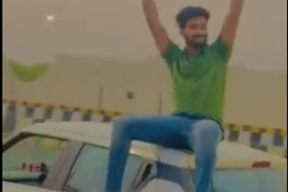 Viral video Youth waves hand poses for picture on moving car on Delhi Meerut Expressway