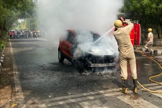 Fire in eco sports car near Rithala metro station husband wife and children survived