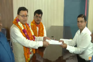 CM Dhami files nomination