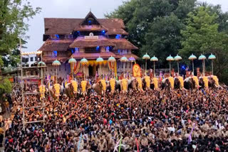 Thrissur Pooram news  Thrissur Pooram Kudamatham  Thrissur Pooram Umbrella Changing  പേമാരിയിലും മുങ്ങാതെ പൂരാഘോഷം  തൃശ്ശൂര്‍ പൂരം 2022  Thrissur Pooram 2022  അവേശത്തില്‍ അലതല്ലി കുടമാറ്റം  കുടമാറ്റം ദൃശ്യങ്ങള്‍