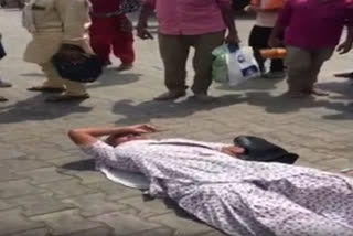 Watch: Elderly woman lying in front of bus due to non-payment of dues by PRTC conductor
