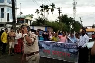 protest blocking roads in sivasagar