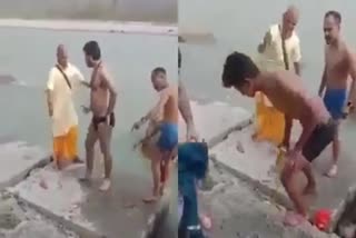 tourists drinking wine in ganga river