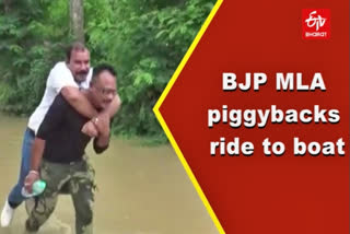 BJP MLA from Lumding Assembly, Sibu Misra was seen taking a piggyback ride to a boat, on the back of a journalist. He was in Hojai to review the flood situation in the area. Assam is witnessing one of the worst flood situation. Over four lakh people have been marooned by the first wave of flood this year. The legislator was taking stock of the flood situation in his constituency. Mishra, however, later clarified that he had to take the piggyback ride as he was not well.