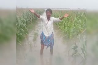 farmer cried for crop loss due to rain