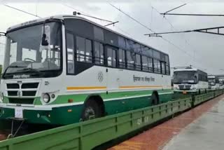 Indian Railways transporting Buses