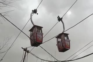 devotees trapped in ropeway