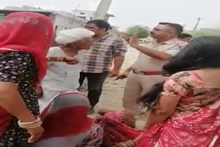 old women got injured during land dipute