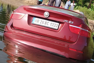 Depressed man sinks BMW car in Cauvery river in Karnataka