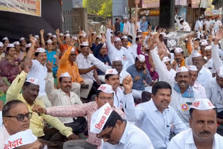 teachers protest in front of collector's office