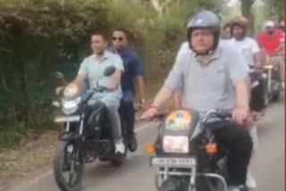 Watch: Uttarakhand CM is doing door to door campaign on motorcycle