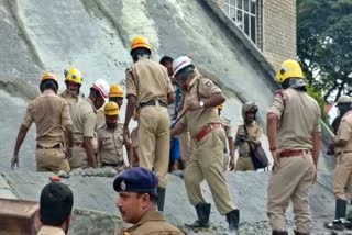 Two workers trapped under rubble