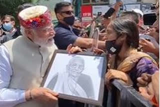 PM Modi breaks security protocol to accept mother's portrait from Shimla's girl