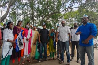 Aam Aadmi Party Protest against dismissal of bribery officer in Bangalore