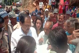 Villagers protest in front of Pauri DFO