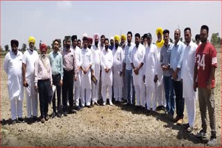 Occupied 35 acres of Panchayat land at village Burj Hakim in Raikot