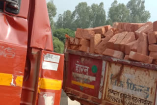 truck collides with tractor trolley