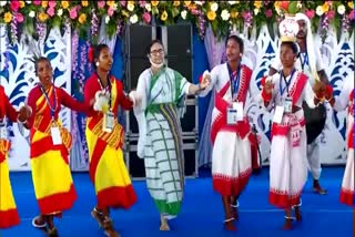 Mamata Banerjee dances with folk artists