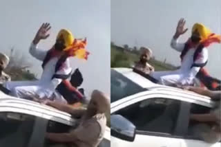 Punjab Transport Minister Laljit Bhullar  Laljit Bhullar stunt goes viral  ഓടുന്ന കാറിന് മുകളിലിരുന്ന് ഗതാഗത മന്ത്രിയുടെ അഭ്യാസ പ്രകടനം  പഞ്ചാബ് ഗതാഗത മന്ത്രി ലാല്‍ജിത്ത് സിംഗ് ബുള്ളര്‍