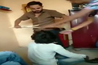 Viral Video From Udaipur Where Men hitting a Man with wooden stick