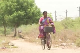 A Woman in Her 60's Hasbeen Riding Bicycle and using it as her transport