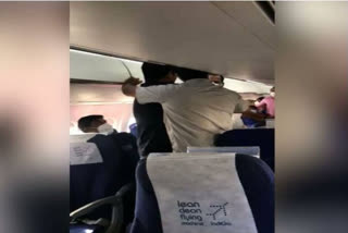 protest against CM inside the flight