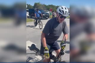Biden falls off bicycle as he rides near beach home in Delaware
