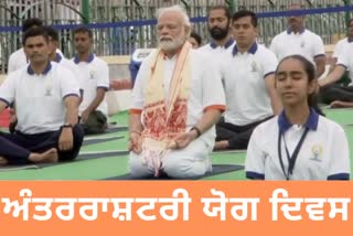 Yoga brings peace to society PM Narendra Modi performs Yoga in Mysuru